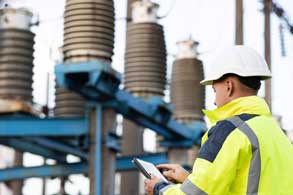 Technician checking a power line