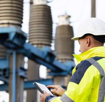 Technician checking a power line